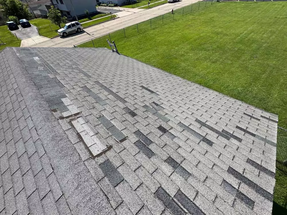 Damaged asphalt shingles